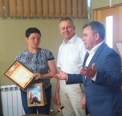 За вклад в социальноэкономическое развитие округа